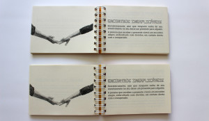 Foto-mostra-dois-livros-dos-encontros-abertos-em-página-sobre-encontros-inexplicáveis